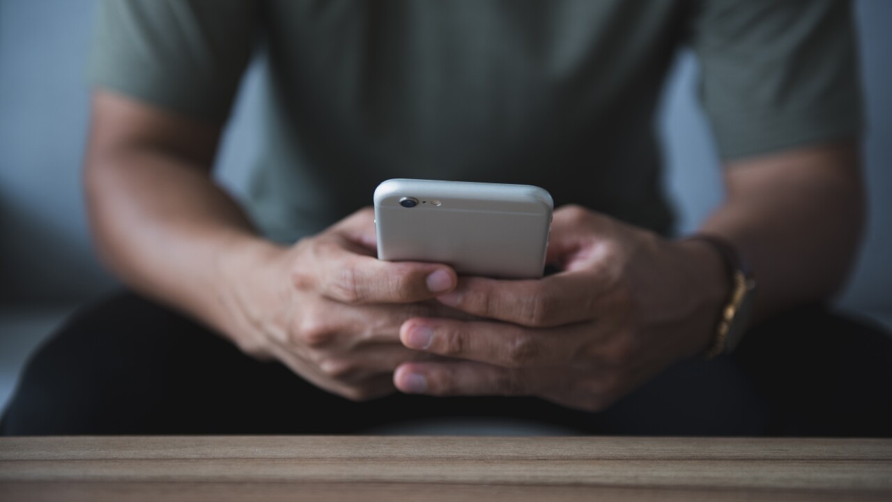 Person holds phone